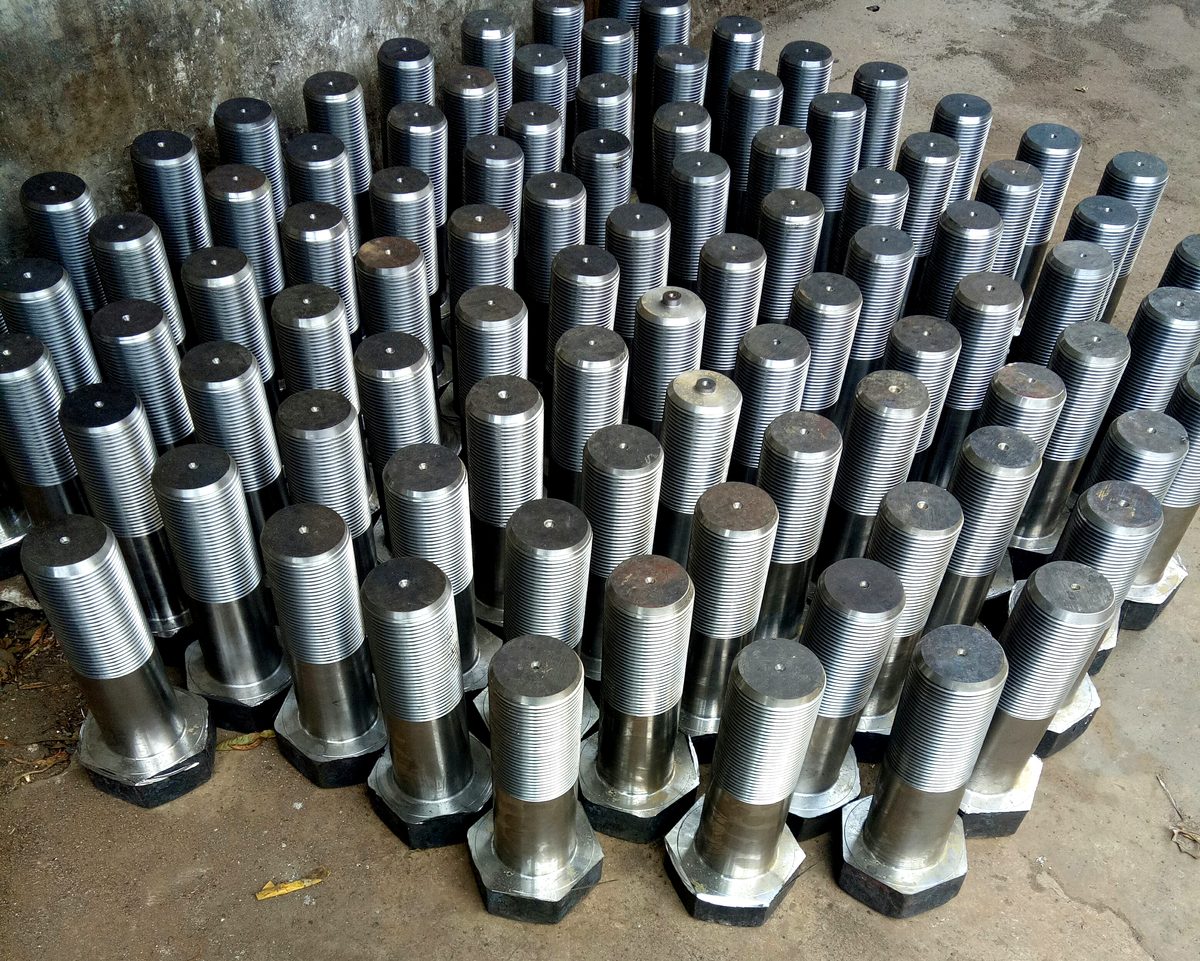 Batch of CNC turned fit bolts with machined shanks and centre-drilled ends, S R Forgings Ludhiana