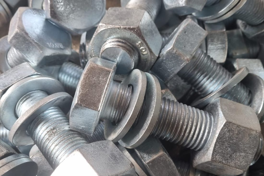 HSFG bolt assembly, property class 10.9S, marked SRF on the head, supplied with nut and two hardened washers, hot-dip galvanised